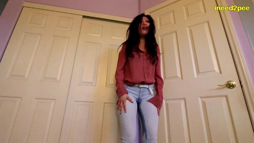 Miss Mia's Solo Pissing Session: Wetting Herself in Skintight Jeans