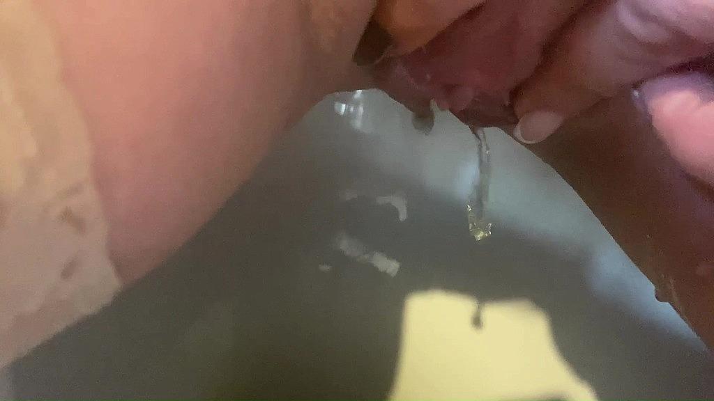 Title: "Naughty MILF's Intimate Piss & Pussy Play Session - HD Fetish Video